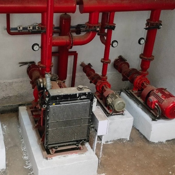 Dewatering pump operating at an infrastructure site